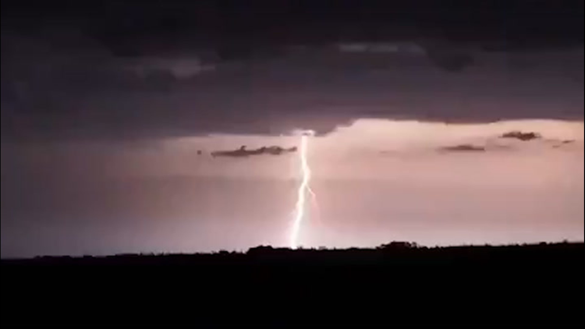 Thunderstorms in the early morning of July 8 gave residents of Graceville, Minnesota, a light show that illuminated the night sky.
