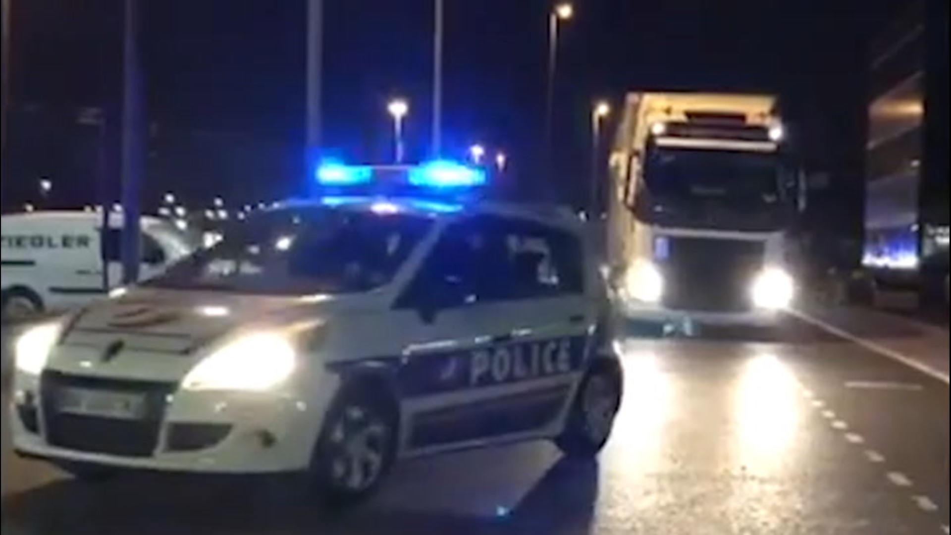 Trucks carrying medical supplies to help those who have contracted COVID-19 were given a police escort in Paris, France, on April 2.