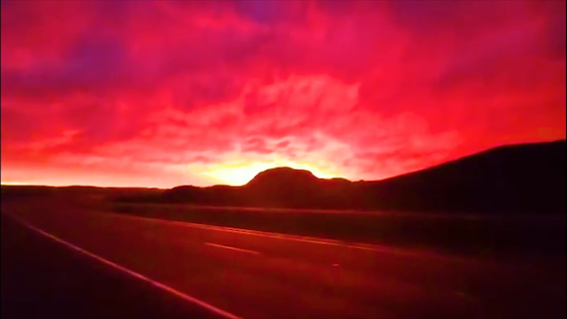 As the sun set, the skies over Glendive, Montana, turned fiery red on July 7, after a thunderstorm struck the area.