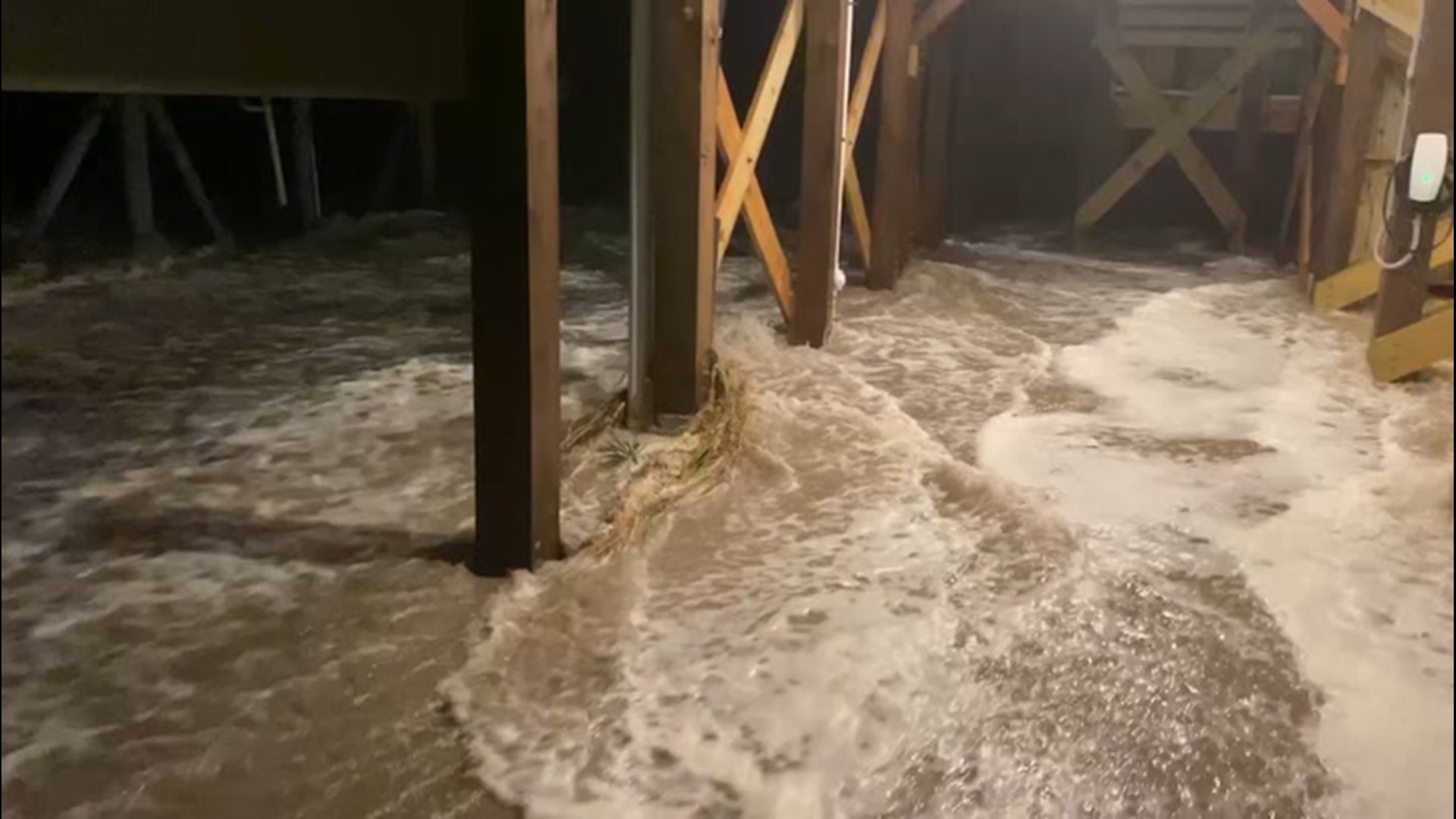 As Isaias lashed the North Carolina coast on Aug. 4, Chris Belliveau's home and truck in Oak Island were flooded by storm surge.