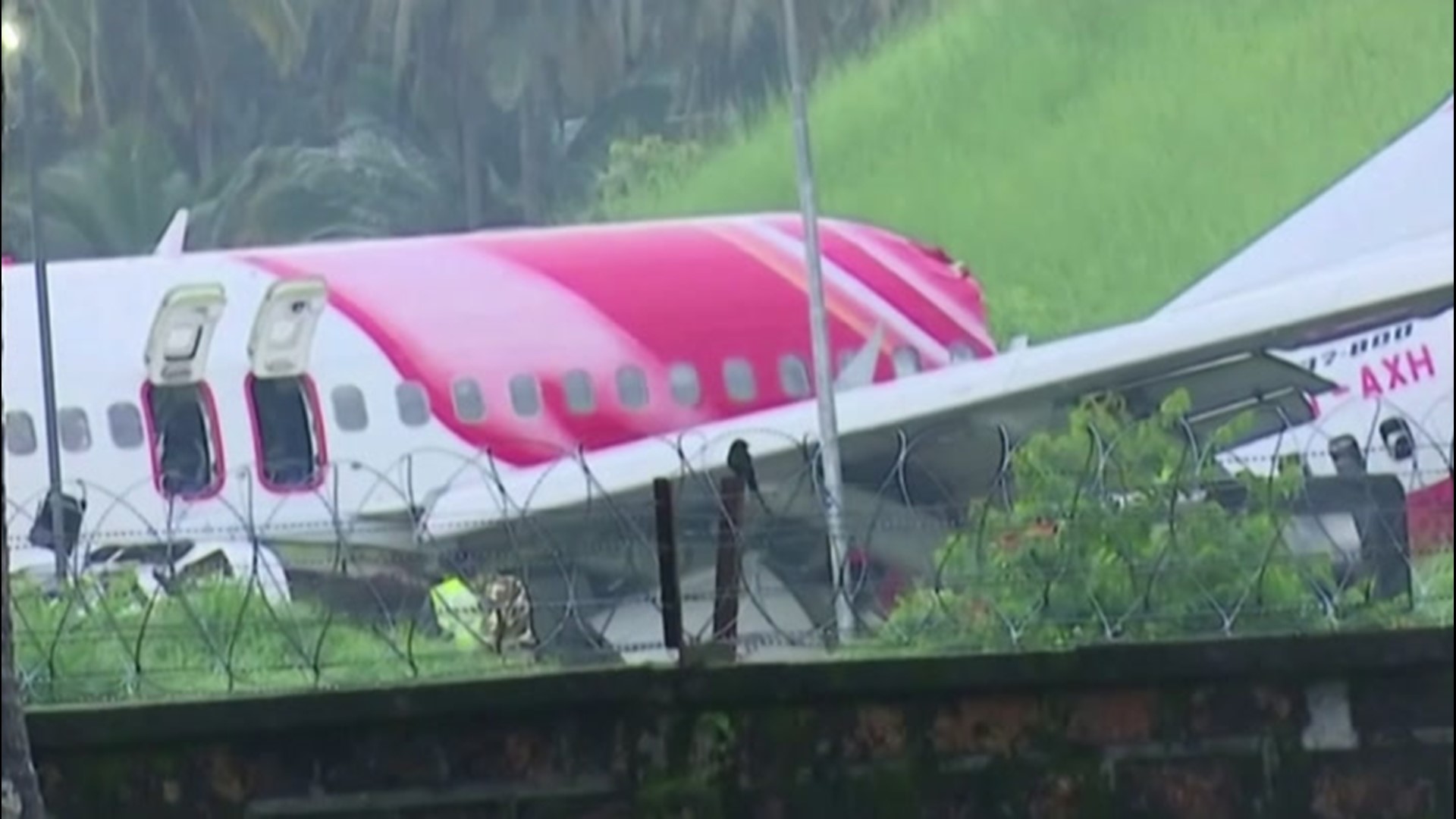 A plane crashed in heavy rainfall in Kozhikode, India, causing at least 18 fatalities on Aug. 7. This is the scene of the wreckage the following day.