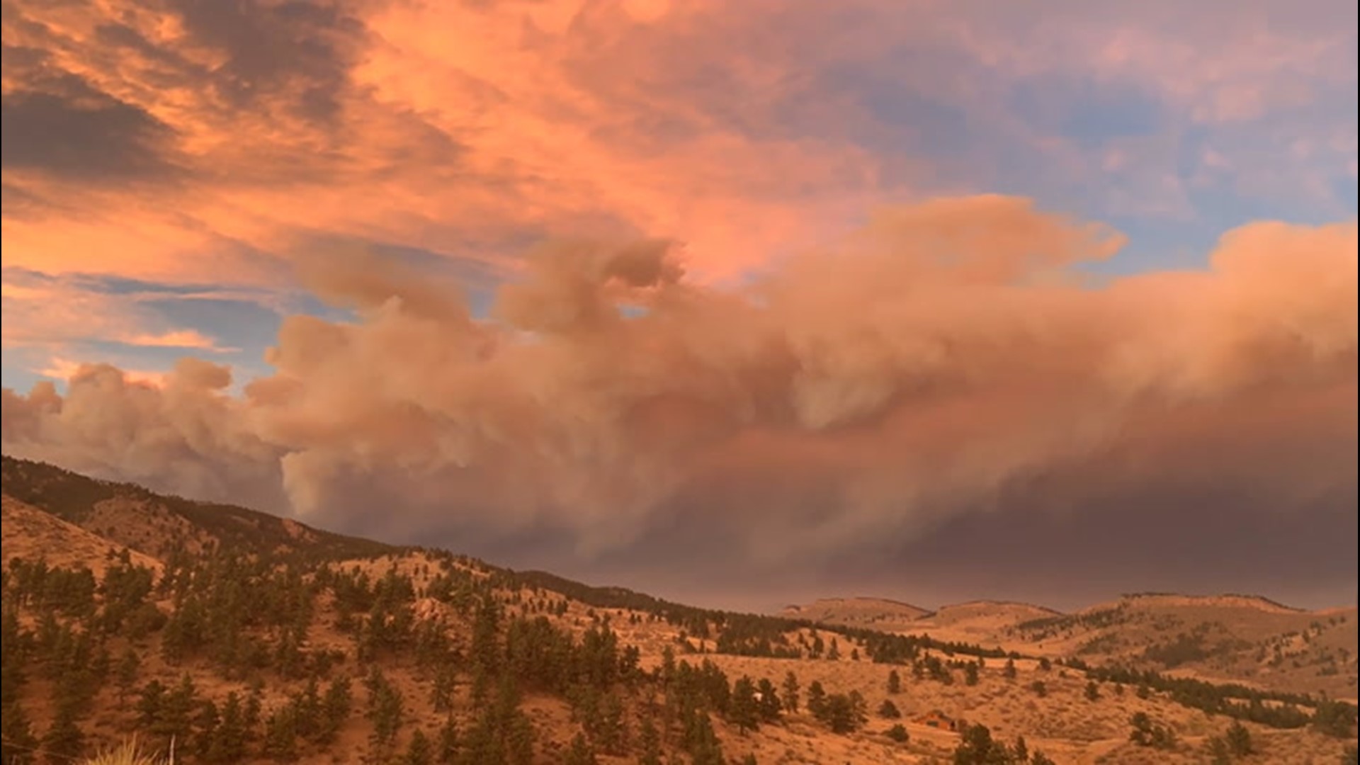 Wind fueled the Cameron Peak Fire on Oct. 16 in Lyons, Colorado, as smoke rose up and blanketed the sky.