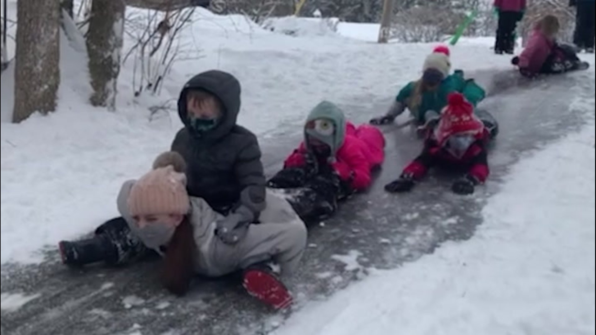 A group of children celebrated their snow day with a fun time sliding down an icy hill in State College, Pennsylvania, on Feb. 1.