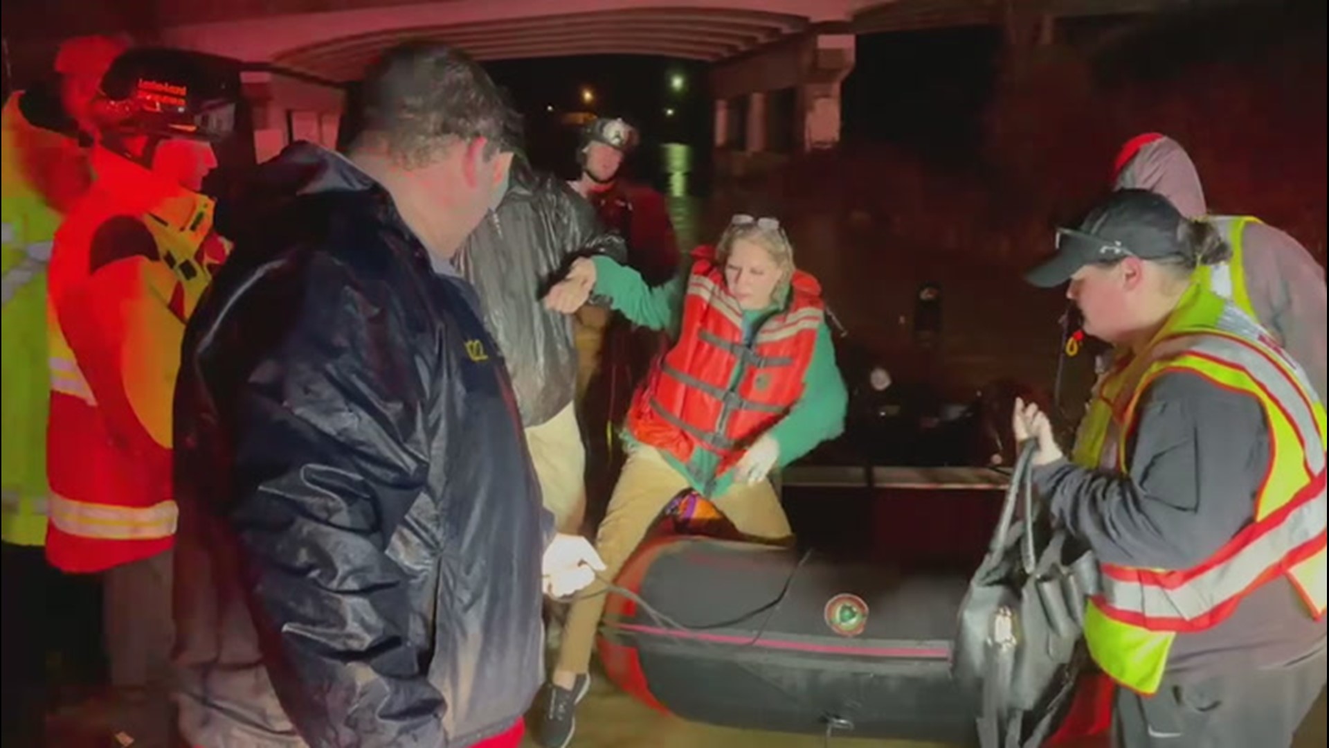 Flash flooding swept through parts of eastern Kentucky on Feb. 28, due to the effects of heavy rainfall in London. This woman was rescued on a raft amidst the flooding.