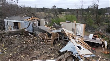 Woman clinging to tree survives a tornado
