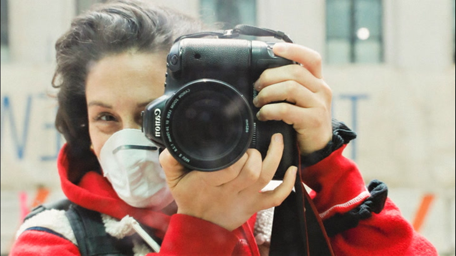Because of the COVID-19 pandemic, people's faces have been covered by their masks. A street photographer in New York is capturing the smiles behind the masks.