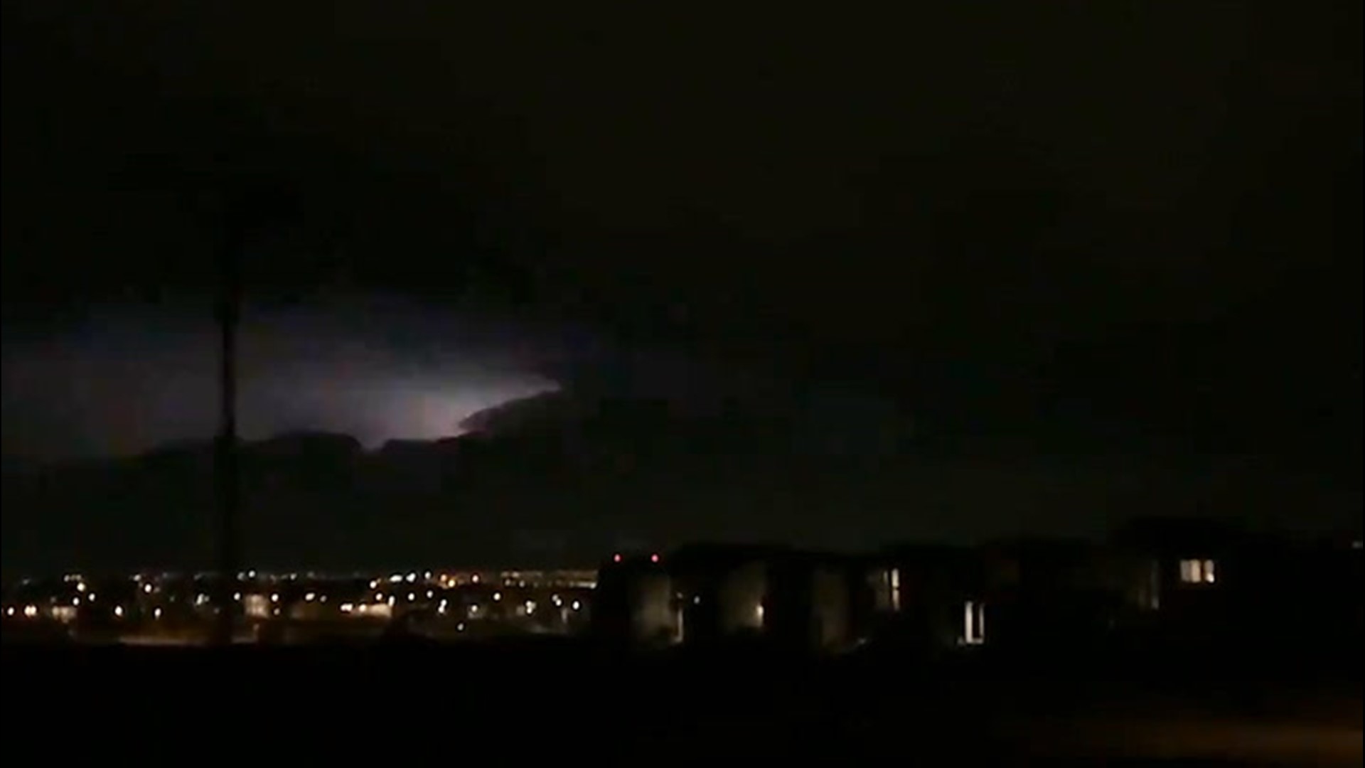 Lightning strikes across the night sky 