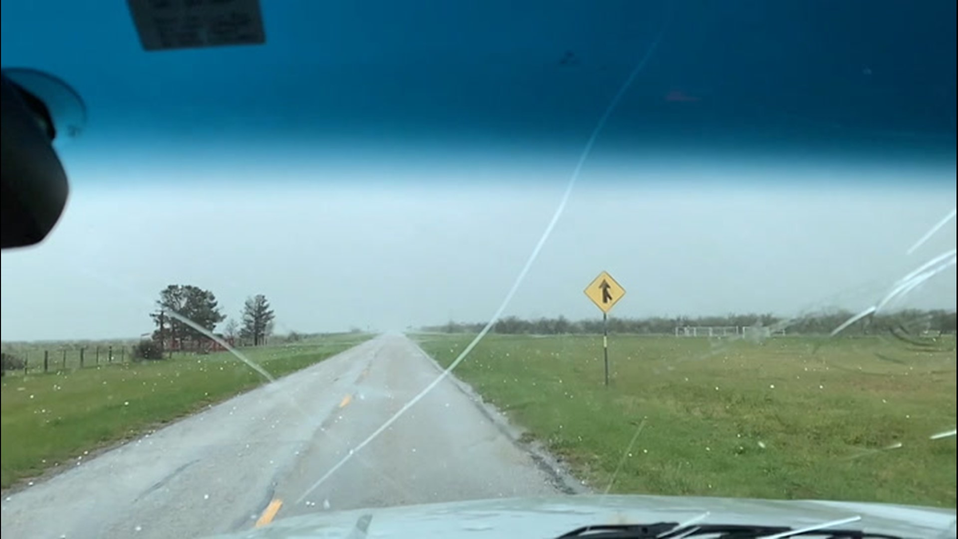 Field meteorologist Brett Adair was tracking severe storms when large hail began falling and damaged the vehicle while traveling in Guthrie, Texas.