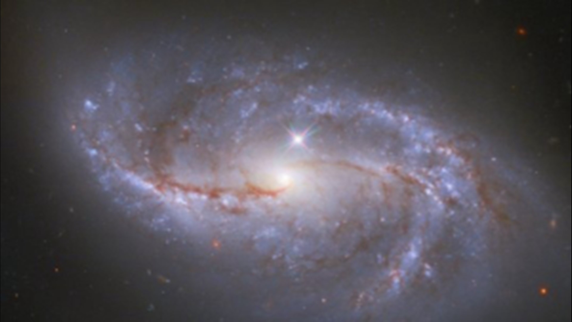 Hubble Captures Arm Like Structures Sweeping Across Spiral Galaxy Wthr Com