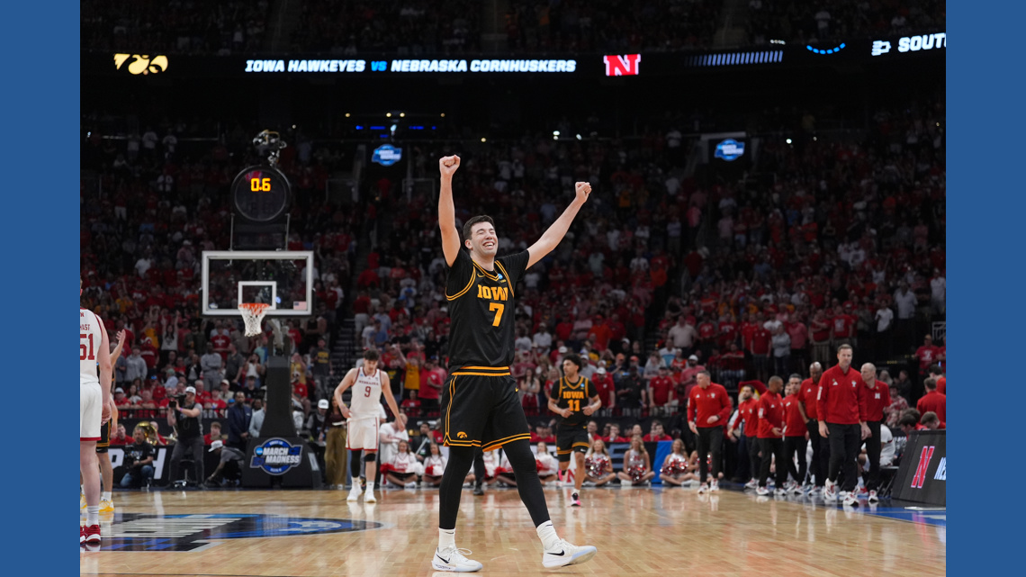 Ninth-seeded Iowa continues improbable March run, beating Nebraska 77-71 to reach Elite Eight