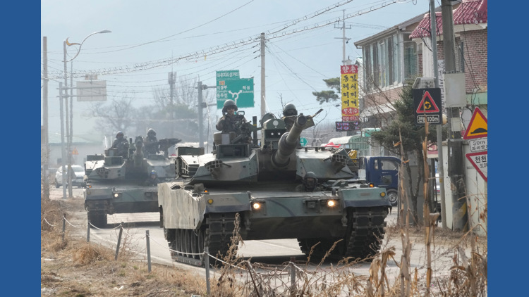 North Korean leader Kim observes test of rocket launch systems with his daughter
