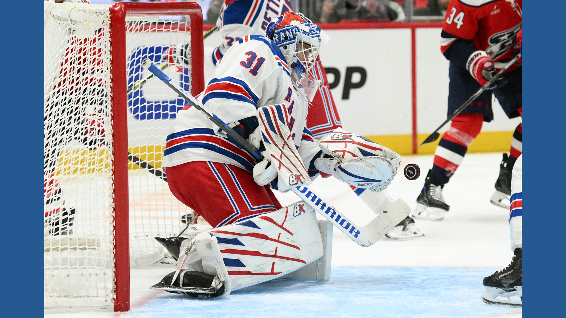 Helped Rangers goalie Igor Shesterkin helped off ice after awkward fall ...