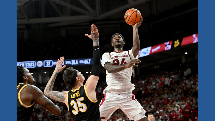 Richmond and Acuff power No. 20 Arkansas to a 94-86 win over Missouri