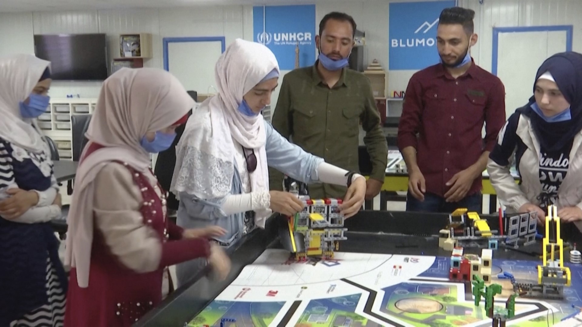 Teenage girls at a refugee camp in Jordan are turning LEGOs into robots.
