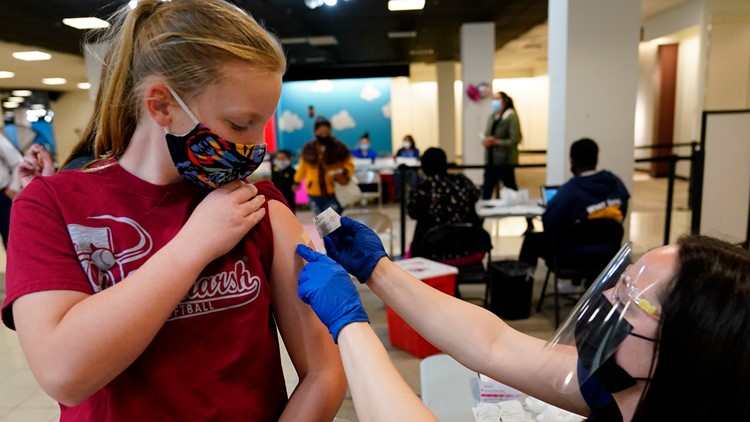 US advisers endorse Pfizer COVID shot for kids 12 and up