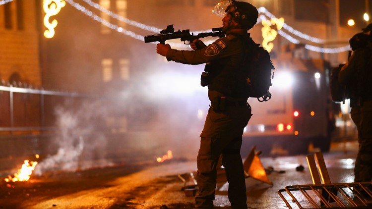 In tense Jerusalem, flag-waving Israeli march to go ahead