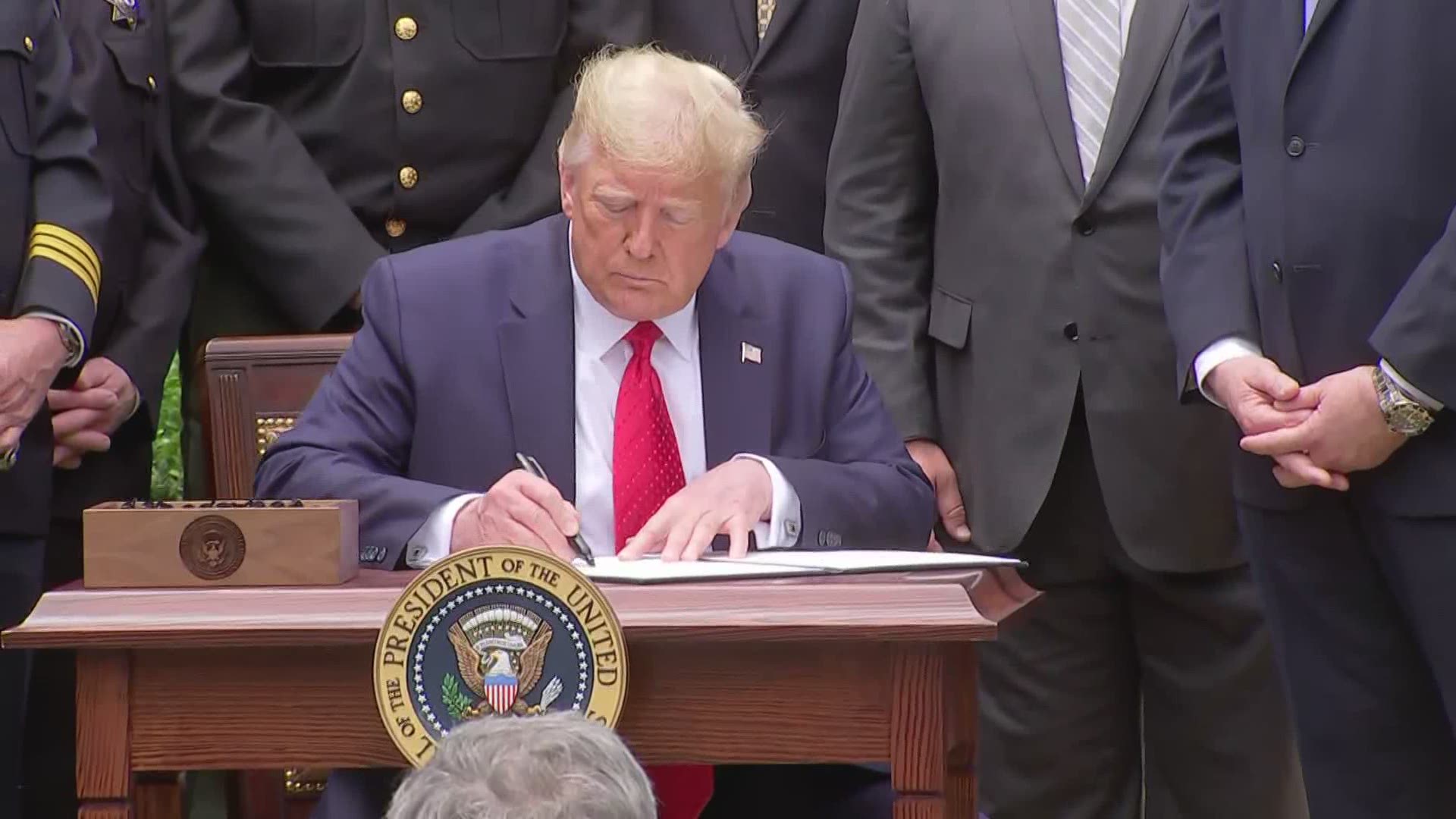 President Trump signs executive order addressing police reform.