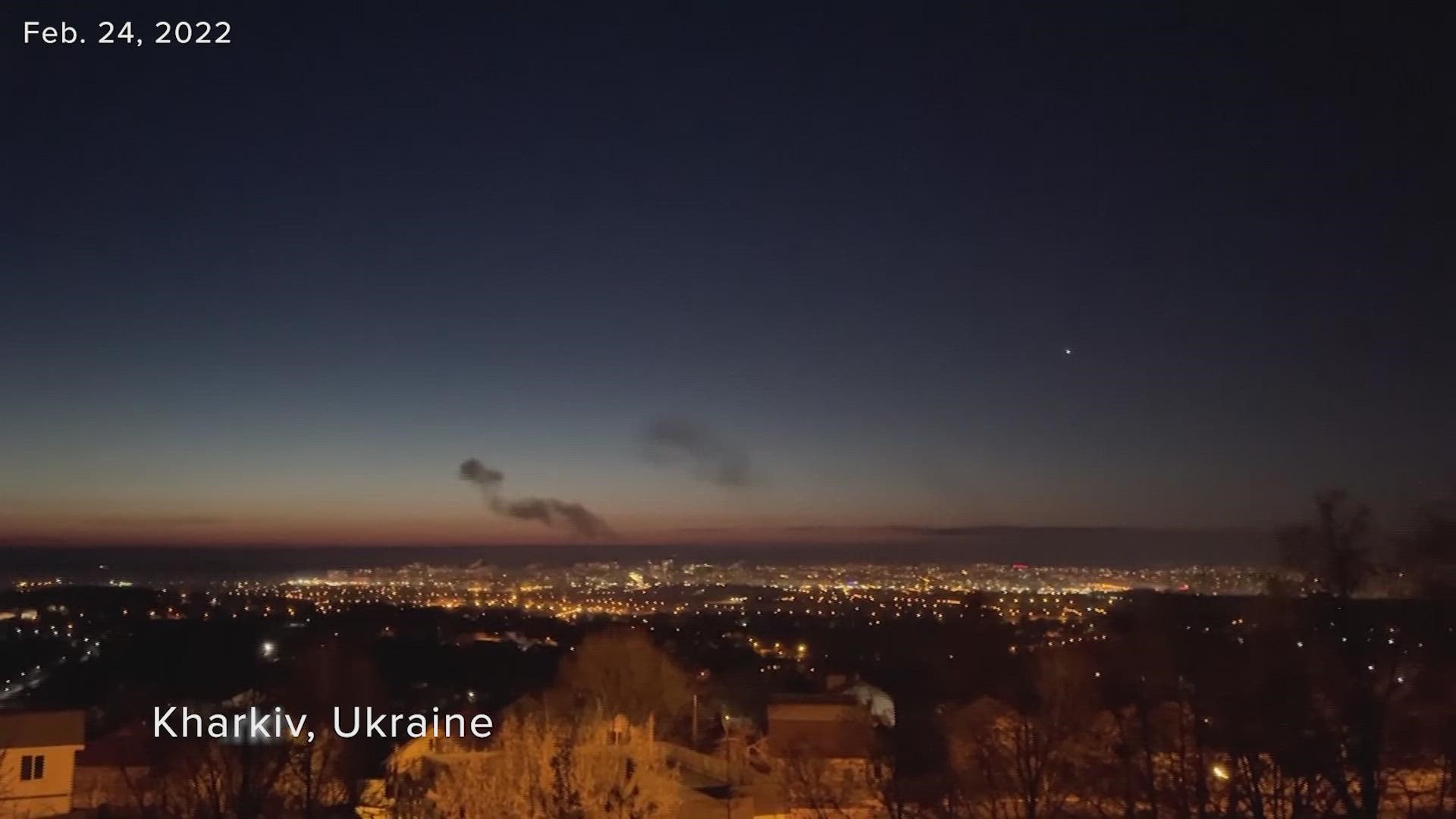 Smoke was seen over Kharkiv, Ukraine, and sounds of explosions were reported after Russia's Vladimir Putin announced a military operation in the country.