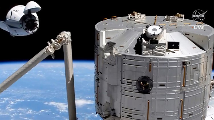 Old SpaceX capsule delivers new crew to space station