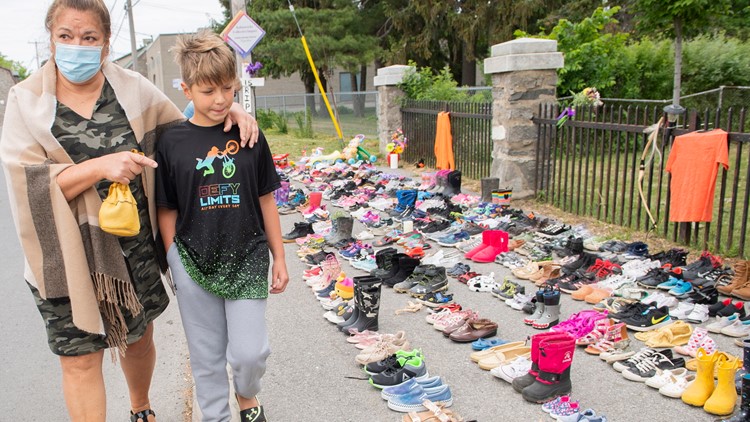 After 215 bodies found at school site, Canada requests flags lowered