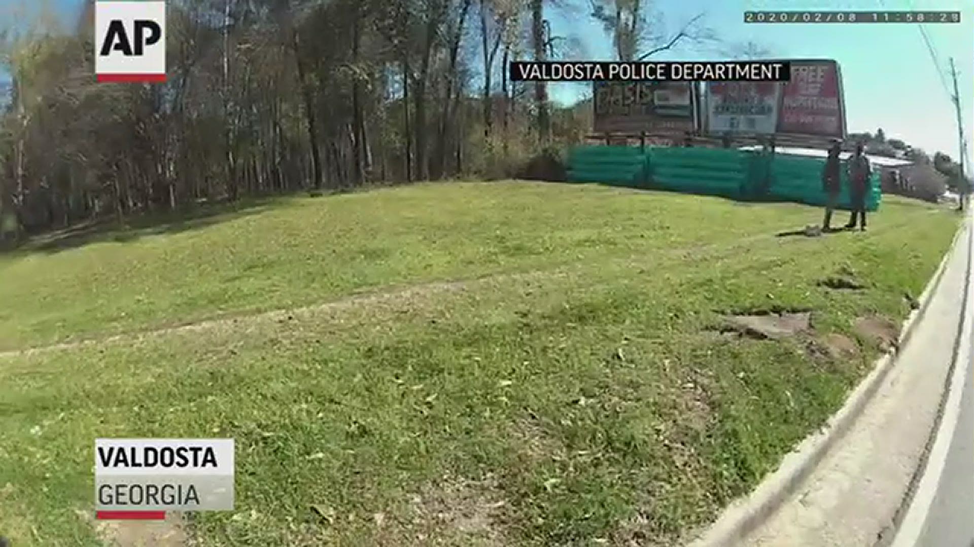 Body camera video shows Antonio Arnelo Smith cooperating before a white officer walks up behind him and slams him face-first to the ground.