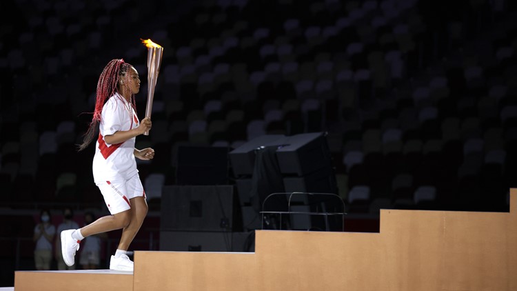 Tennis star Naomi Osaka lights Tokyo Games cauldron Tennis star Naomi Osaka lights Tokyo Games cauldron