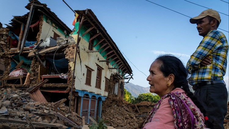 Nepal villagers cremate loved ones who perished in earthquake that shook its northwest, killing 157