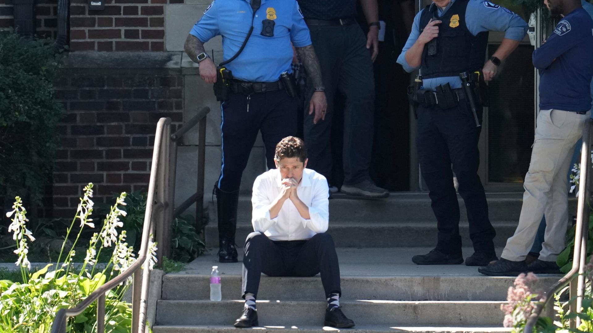 Police say a lone gunman dressed in black approached Annunciation Church just before 8:30 a.m. and started firing at worshipers through the windows. 