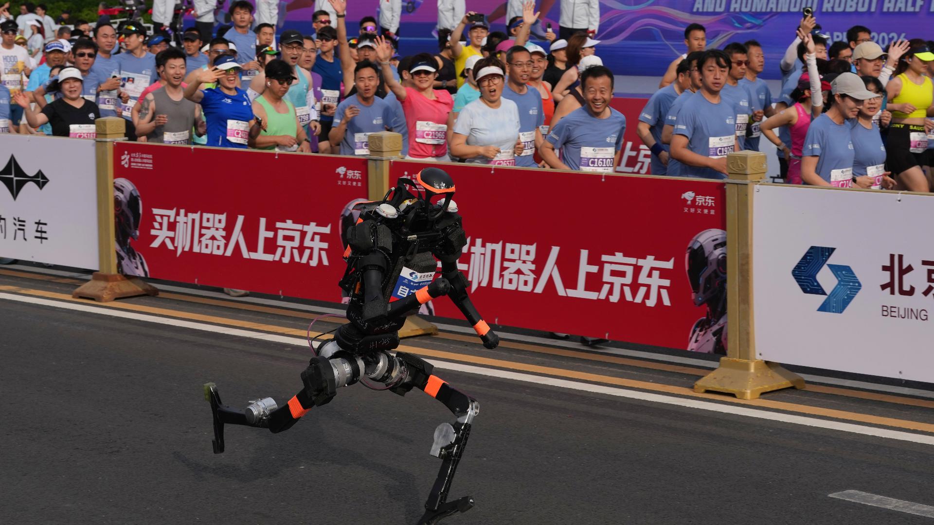 Winner of half-marathon race for robots finishes with faster time than ...