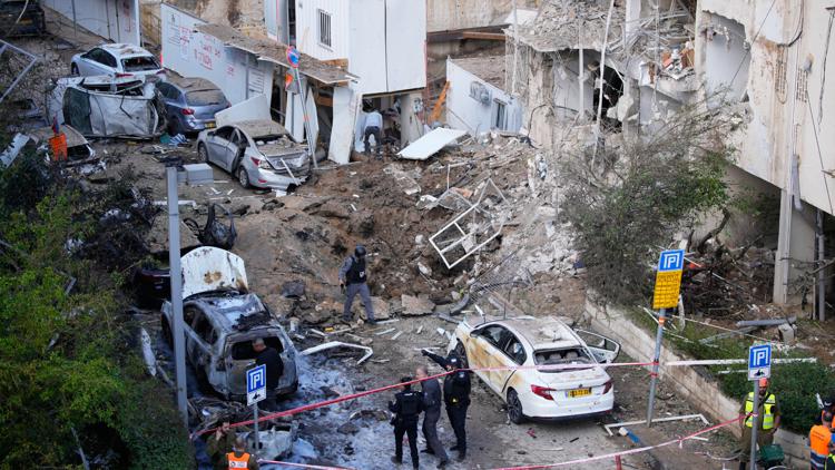 Iran targets Israel and Gulf Arab states even as Trump says US is in talks to end the war