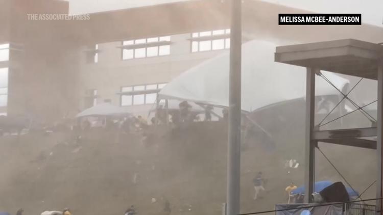 WATCH: Strong wind at NCAA baseball tournament in West Virginia sends 5 people to the hospital