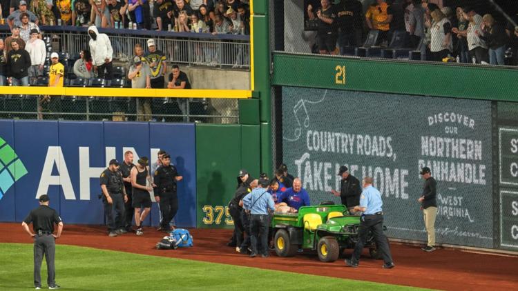 Medical team rushes in after fan's 21-foot fall during baseball game