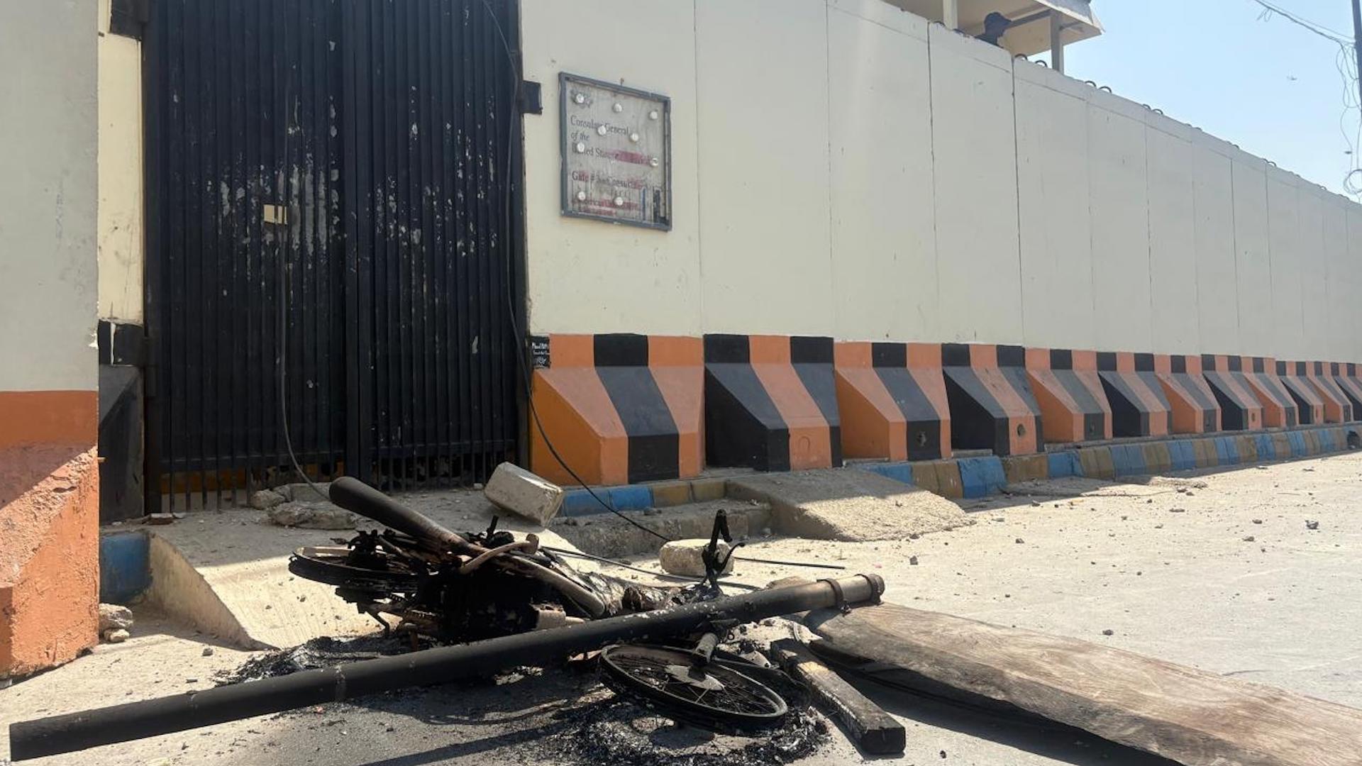 News footage showing a security incident, highlighting the context for the US Consulate Peshawar operational changes.