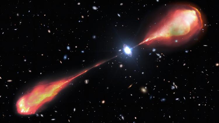 Telescopes spy a monster radio jet streaming from a bright and early object in the universe