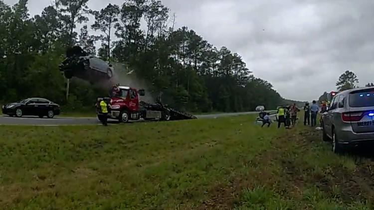 Car sent flying after launching off tow truck ramp in Georgia