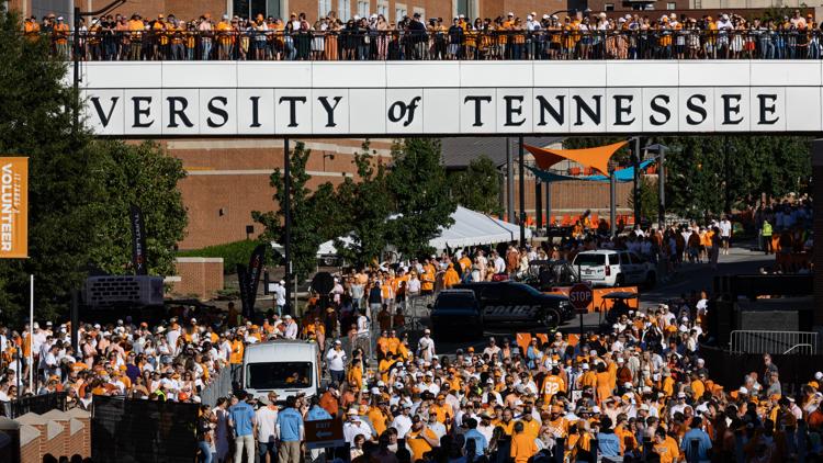 Air Force One flies low over football stadium as President Trump arrives in Tennessee to attend SEC matchup
