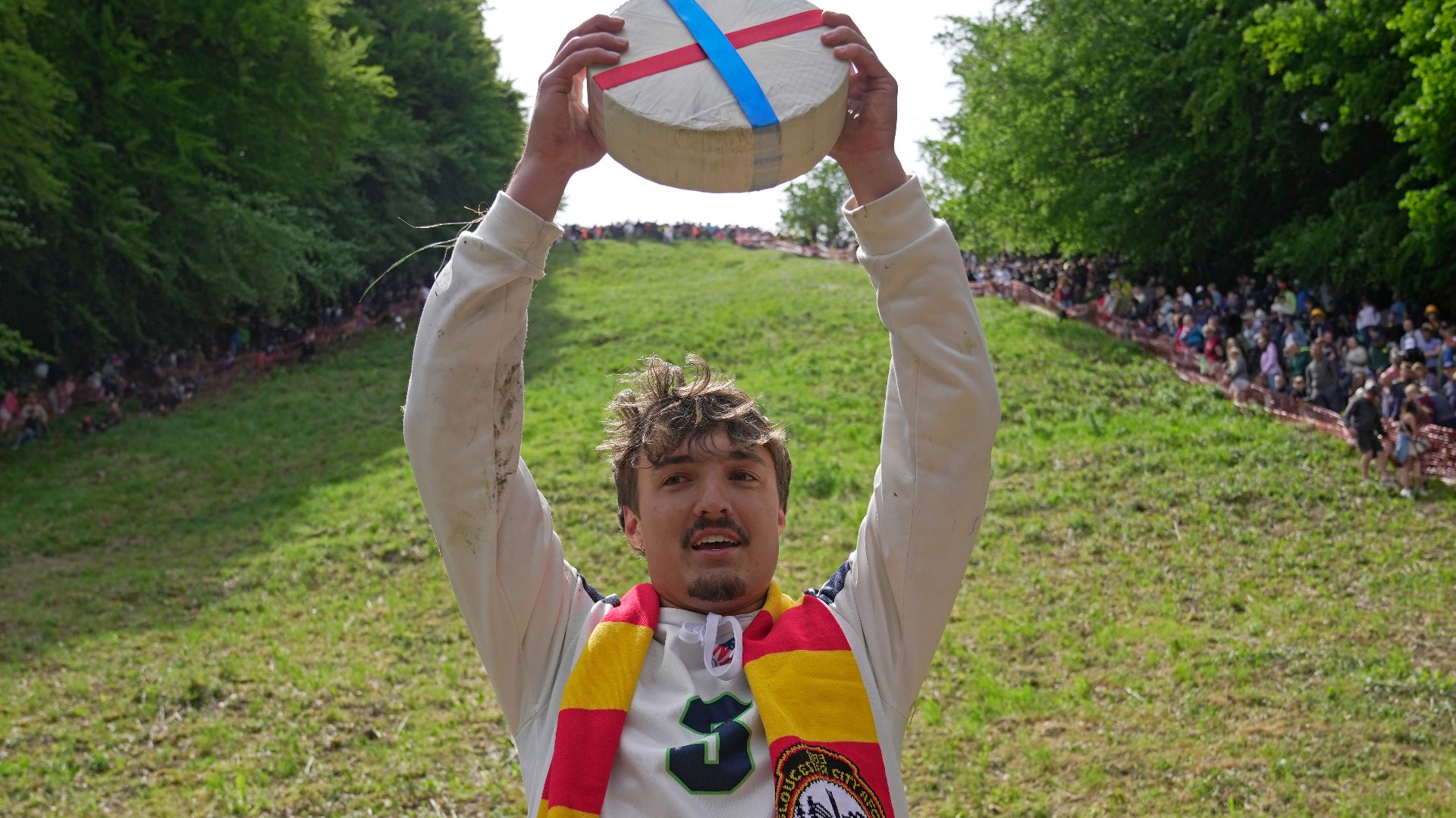 American man wins chaotic UK race chasing cheese down a hill | wthr.com