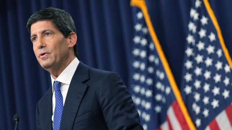 Federal Reserve hikes key rate for 1st time in 3 years, defying Trump demands for a cut