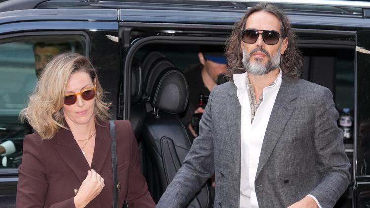 Russell Brand arrives at a London court for his trial on rape and sexual assault charges