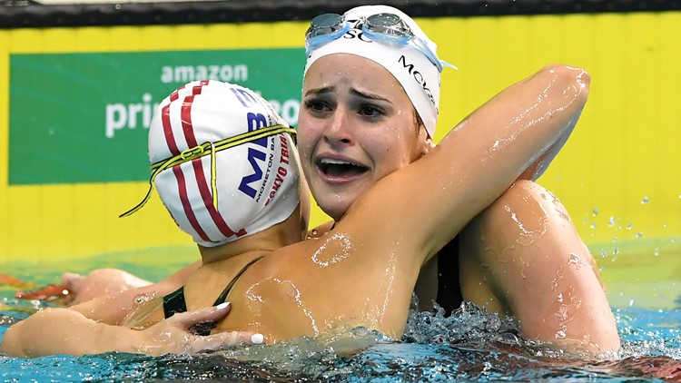 Australian swimmer breaks 100-meter backstroke world record Australian swimmer breaks 100-meter backstroke world record
