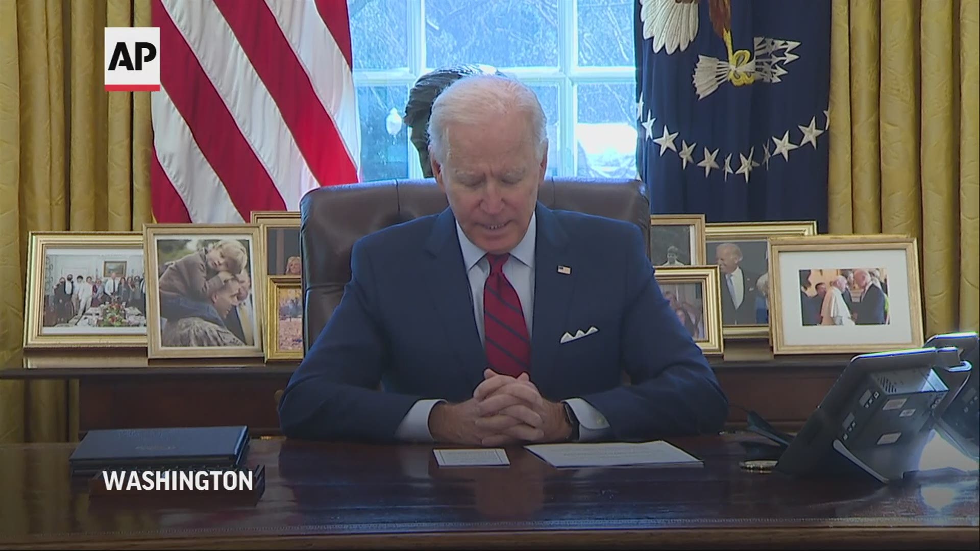 Biden signed directives Thursday on a range of issues including getting more Americans health insurance and rescinding a regulation barring U.S. aid for abortions.