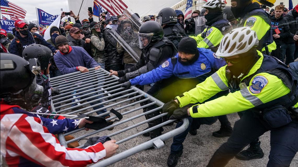 Officers who defended Capitol from rioters sue to block payouts from $1 ...