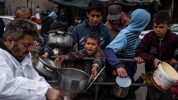 Biden approves military airdrops of aid into Gaza after chaotic encounter left more than 100 dead
