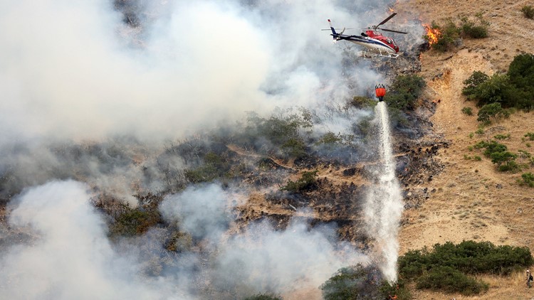 Utah man accused of causing wildfire by burning a spider
