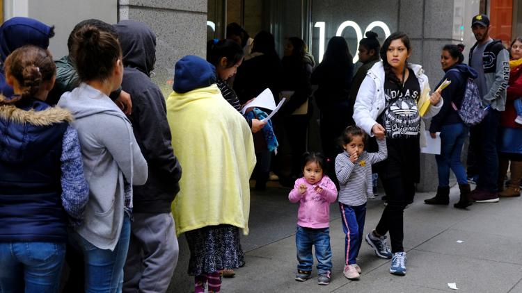 Trump administration revives rule that could deny green cards to immigrants who use public benefits