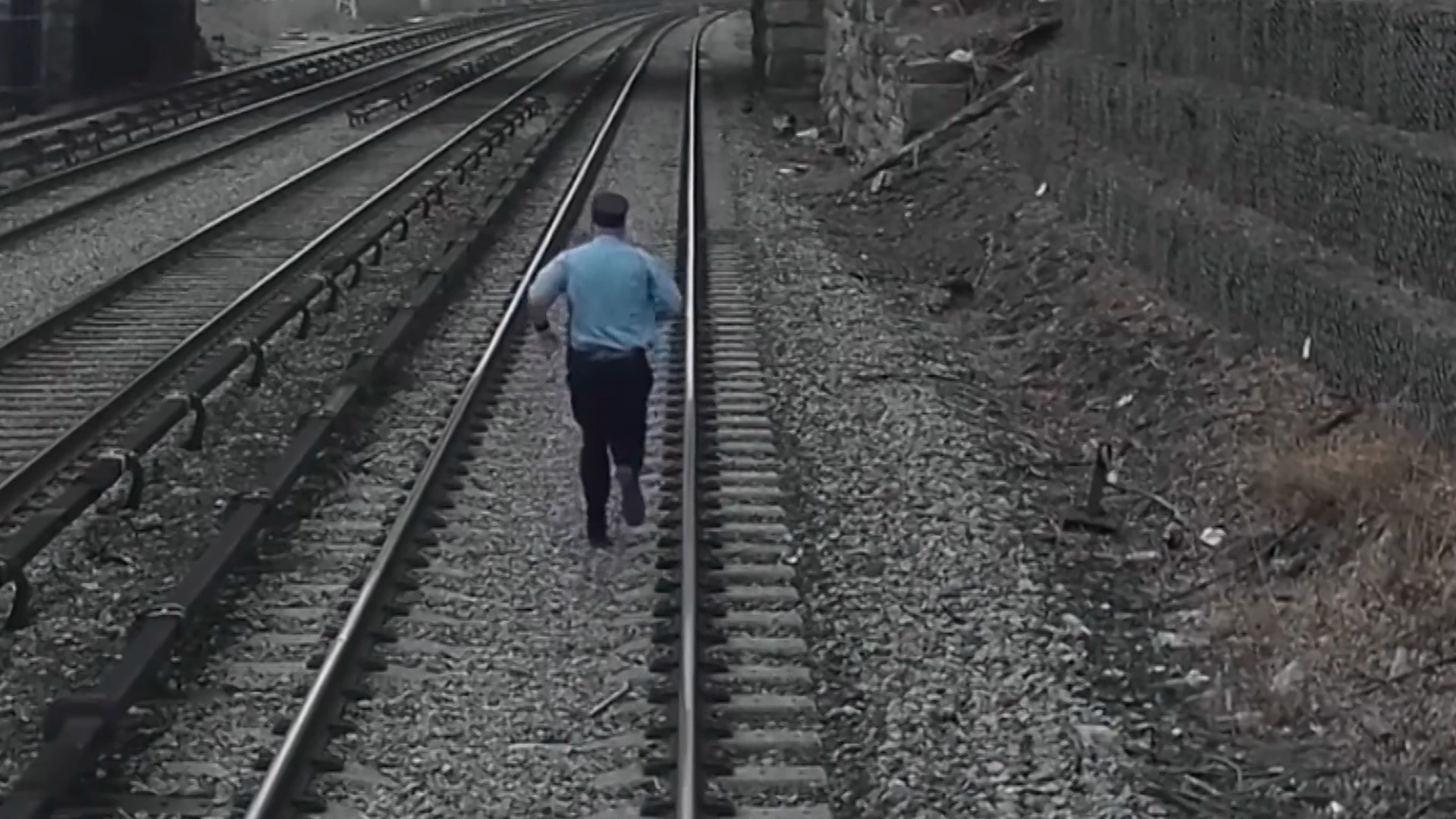A railroad conductor in New York sprinted to scoop up a 3-year-old boy who had wandered dangerously close to the electrified third rail, officials said this week.