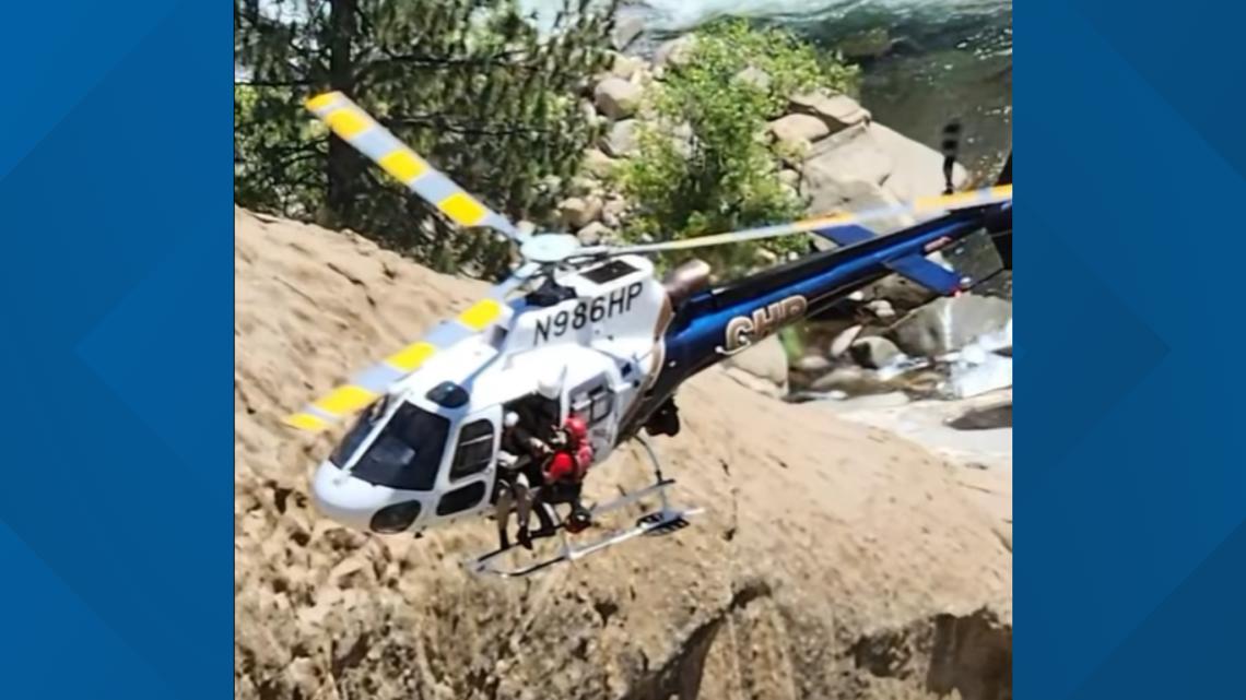 Helicopter team rescues man trapped behind California waterfall ...