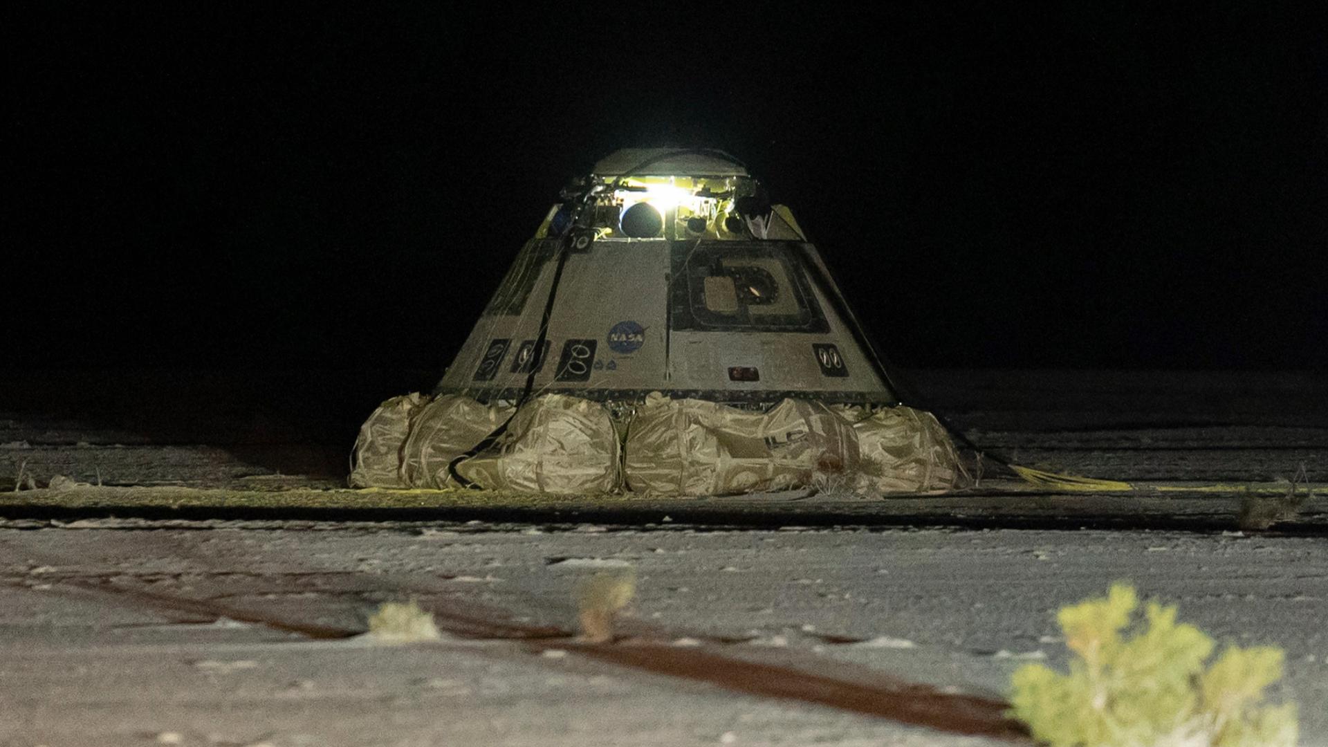 Six hours after departing the International Space Station, Starliner parachuted into New Mexico’s White Sands Missile Range, descending on autopilot.