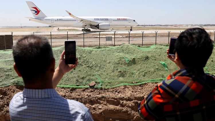 Chinese airliner crashes with 132 aboard, massive fire seen near crash site