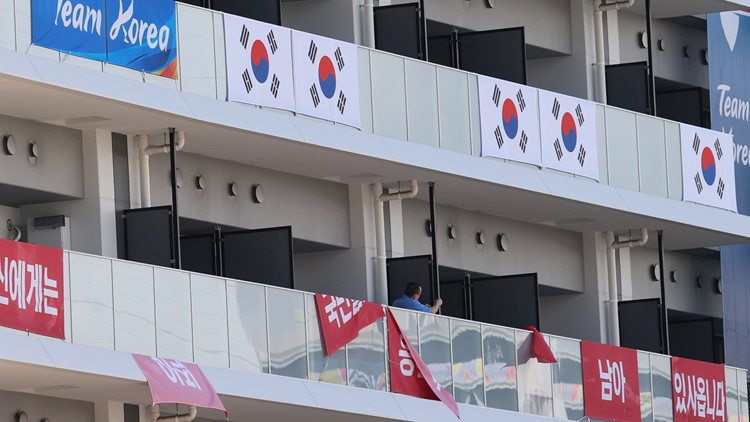 South Korea removes banners at Olympic village after IOC ruling South Korea removes banners at Olympic village after IOC ruling